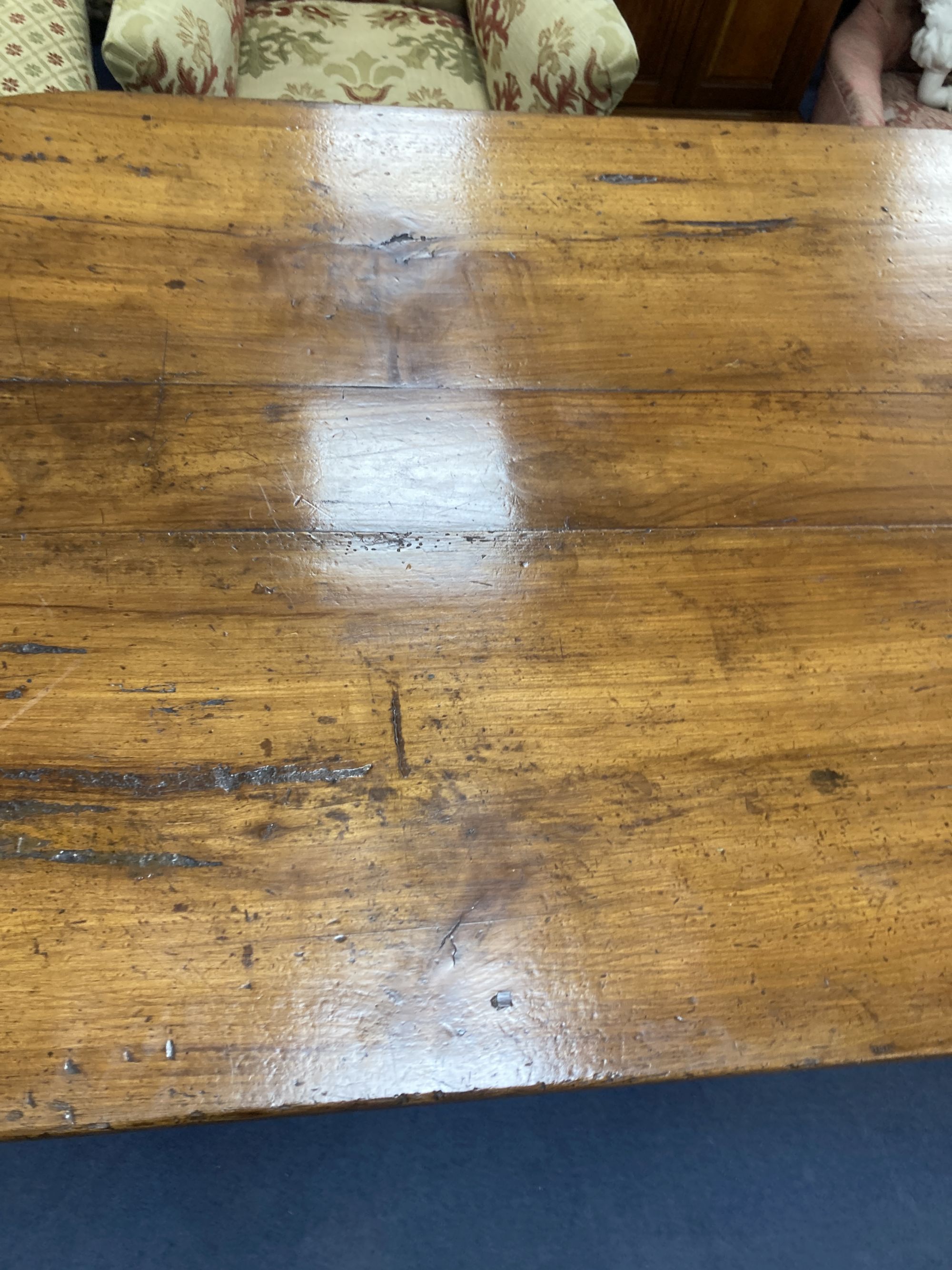A 19th century fruitwood provincial dining table on square tapered legs, length 210cm, depth 90cm, height 77cm